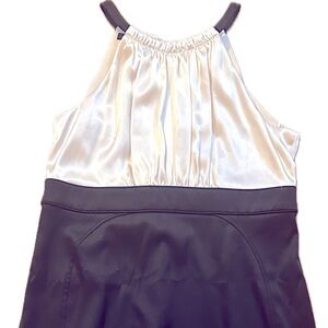 Jones wear satin cream and black midi dress.